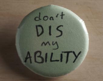 Button with hand written text Don't dis my ability.